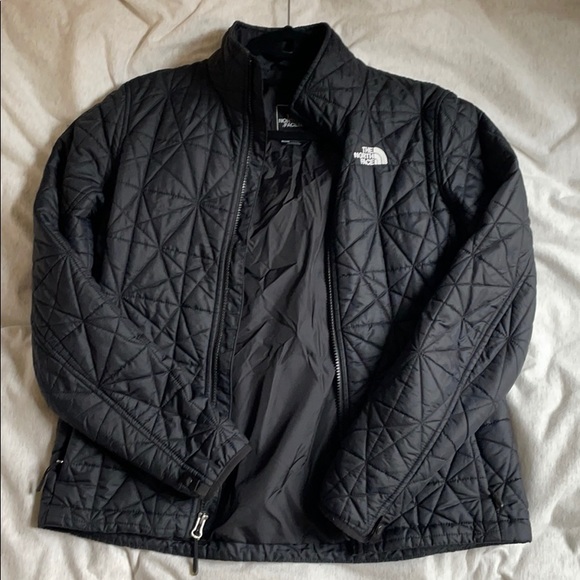 Black North Face shell jacket w/ patterned outside